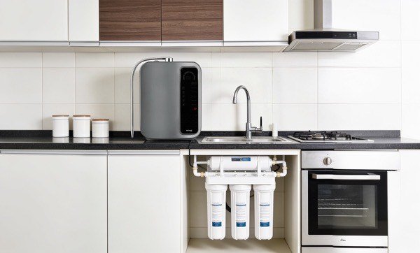 SOMAWA Amara NXT installed in a modern kitchen with RO unit visible below the counter